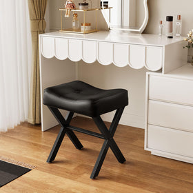 Memobarco saddle-seat vanity stool in black showcases thick padded cushion.