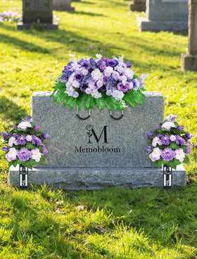 Memobloom grave saddle with adjustable clips for easy installation on most headstones.