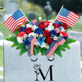 Memobloom patriotic saddle on a grave with lasting red, white, blue roses.