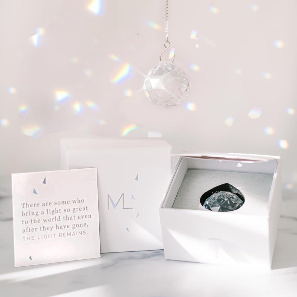 Memorialight rainbow crystal ornament 40mm bathed in sunlight for daily remembrance.
