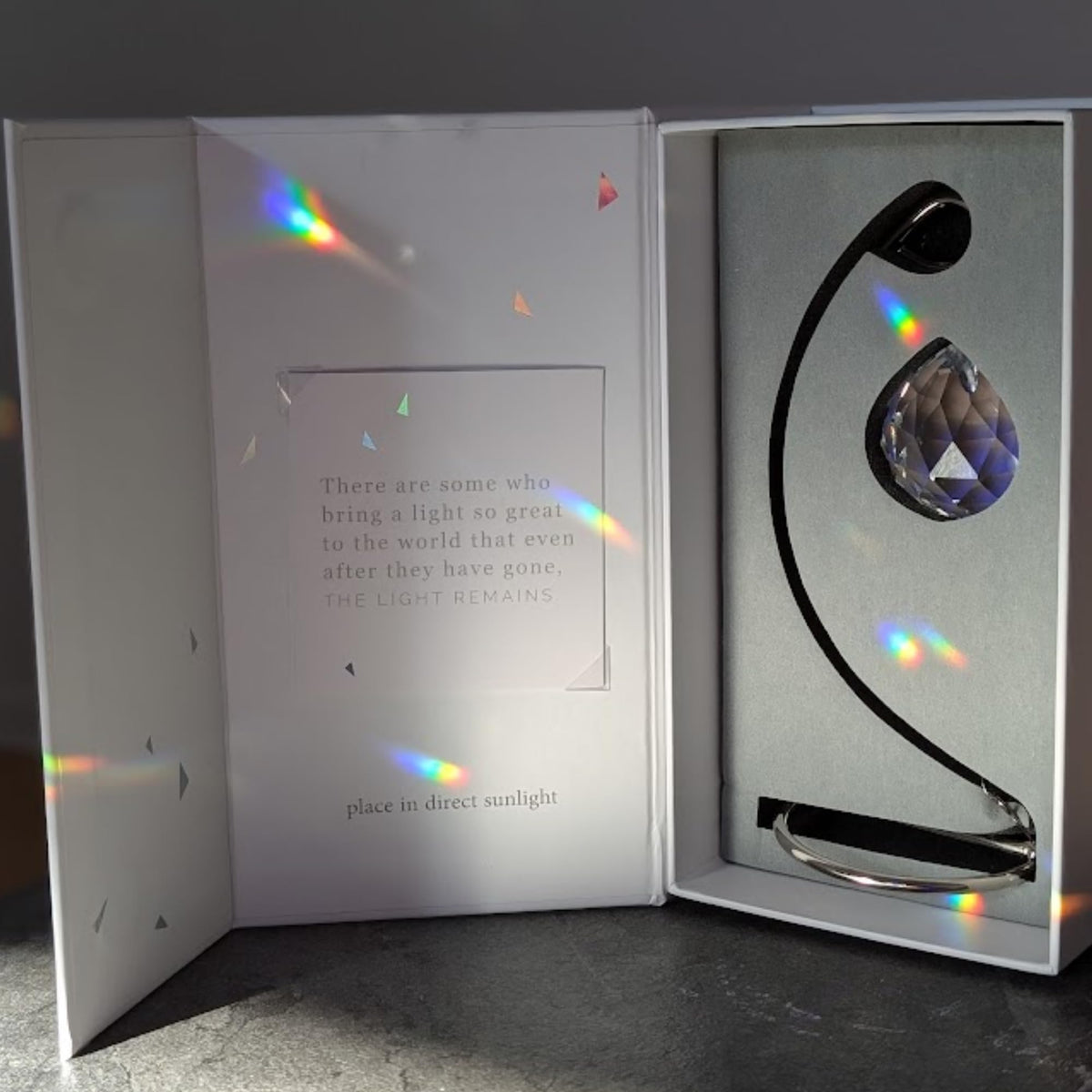 Sunlit Memorialight rainbow display in home setting
