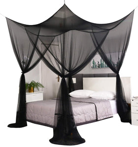 Mengersi bed canopy over a large bed offering insect protection and style.