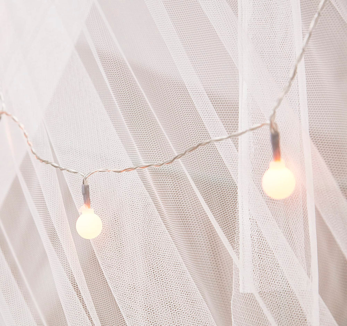 Mengersi canopy lights detail highlighting decorative glow for evenings.