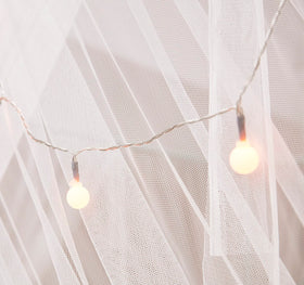 Mengersi canopy lights detail highlighting decorative glow for evenings.