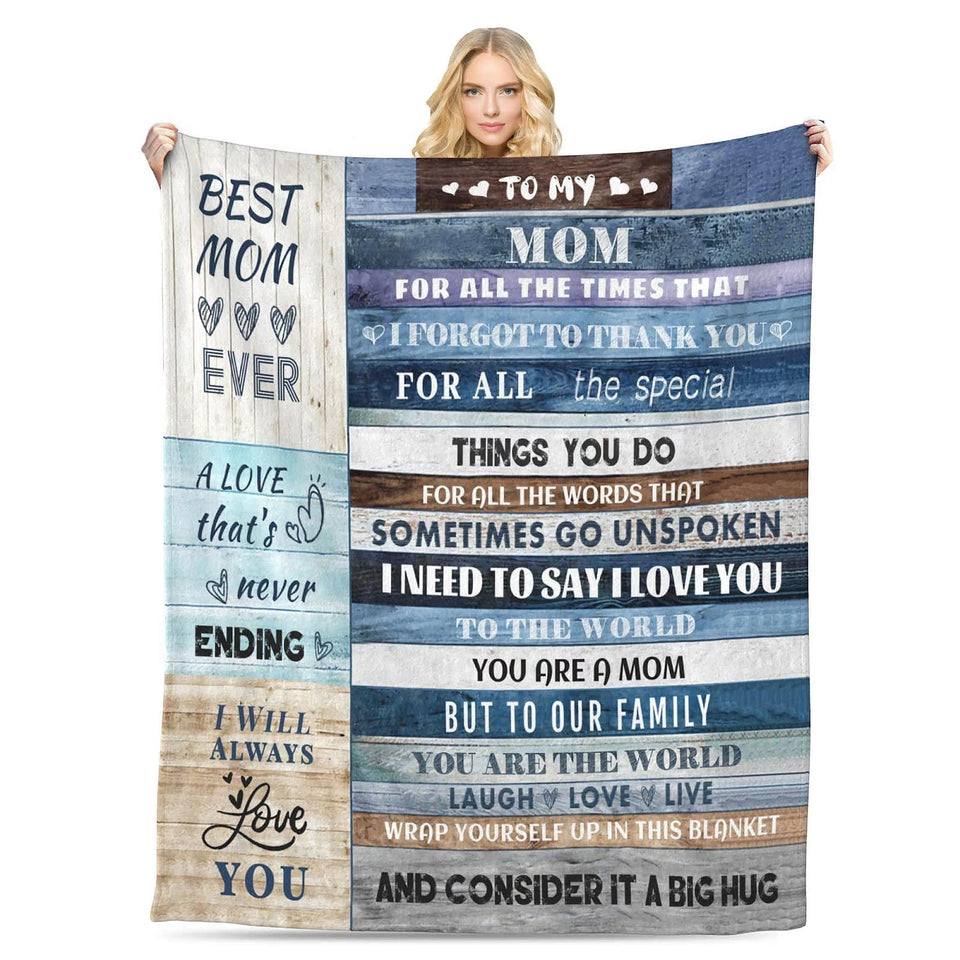 Menghao gift blanket for mom shown as a soft flannel throw on a stylish sofa.