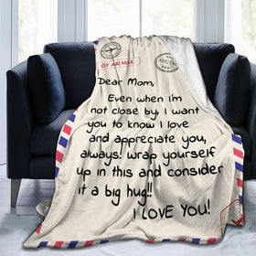 Menghao throw blanket on sofa inviting warmth for relaxation and family moments.
