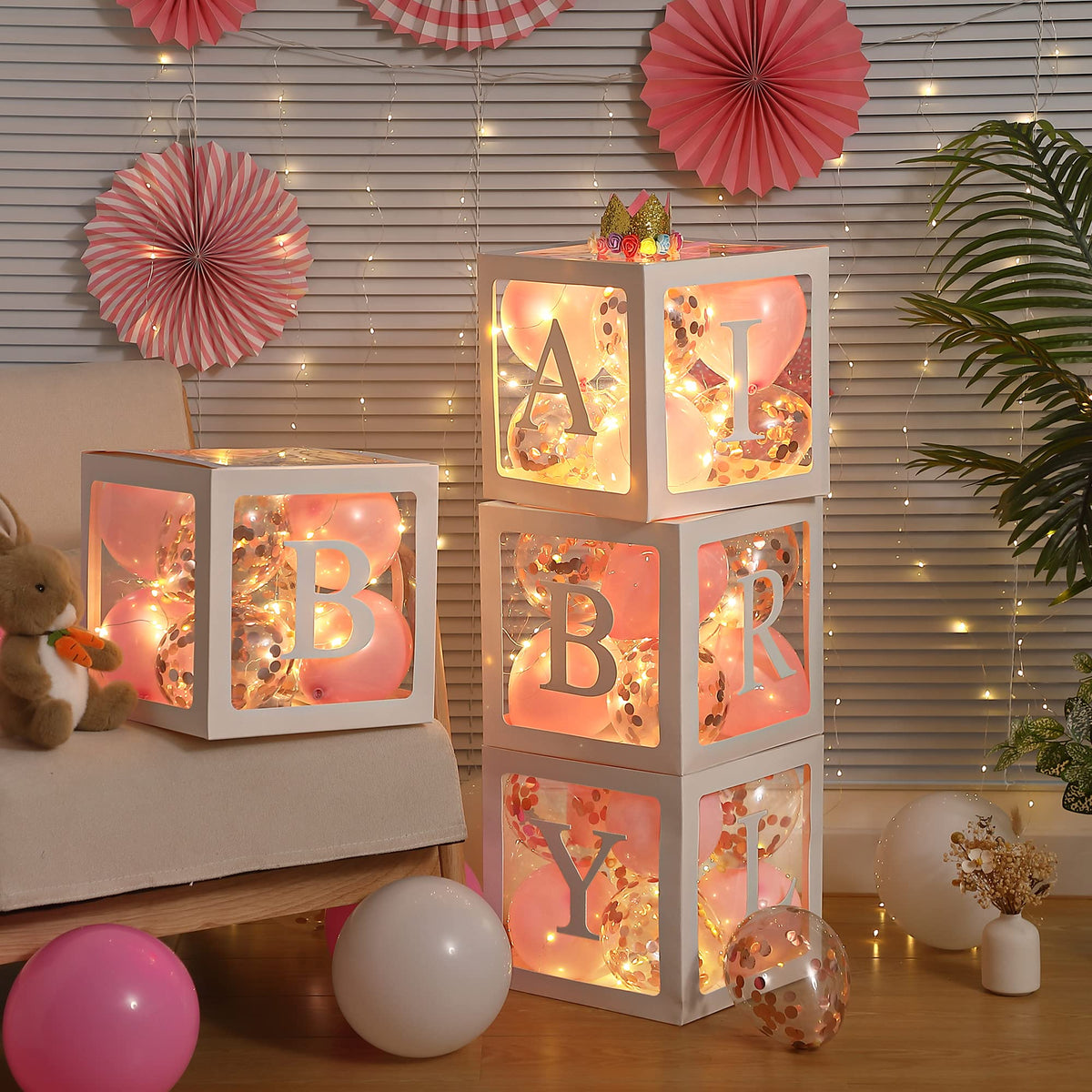 Meonum baby girl letters on the box create a personalized baby shower décor.