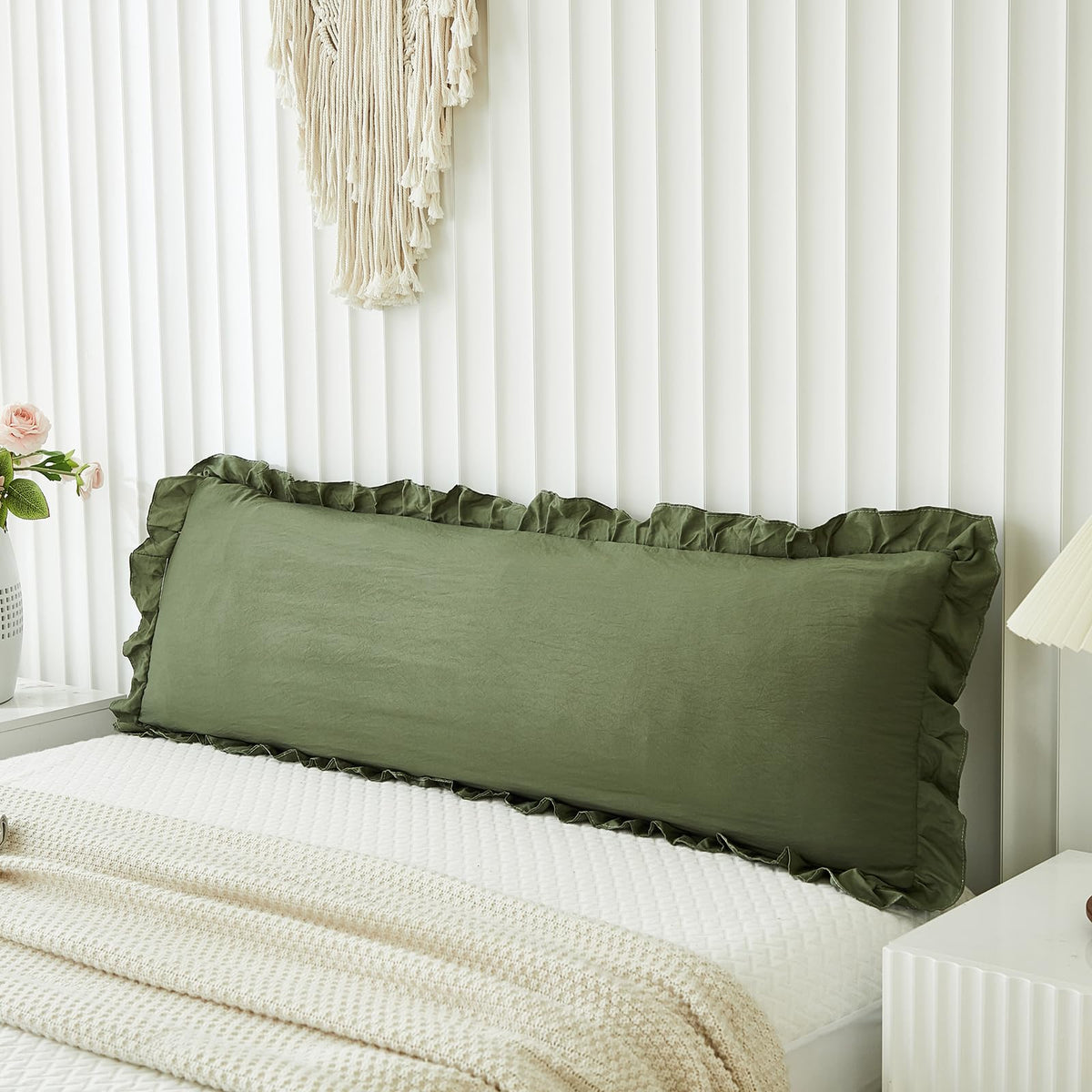 Merryword olive-green body pillow cover on bed adds warm shabby chic style.