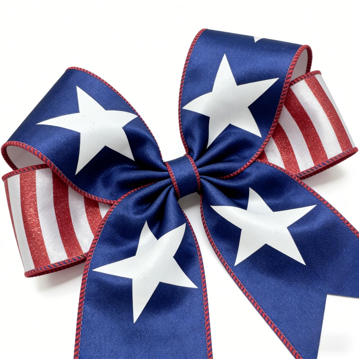 Meseey door bow crafted with patriotic ribbon for standout curb appeal.
