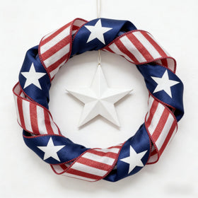 Meseey patriotic ribbon on wreath, holds shape for festive door accents.
