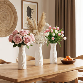 Meyeyaia white plastic vases for centerpieces, versatile with blooms.