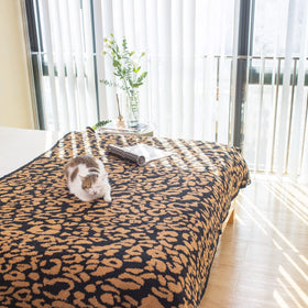 MH MYLUNE HOME indoor-outdoor leopard throw ideal for homes and trips.