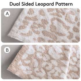 Leopard blanket on couch provides comfortable lounging with style
