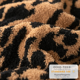 MH MYLUNE HOME machine-washable leopard blanket simplifies laundry day.