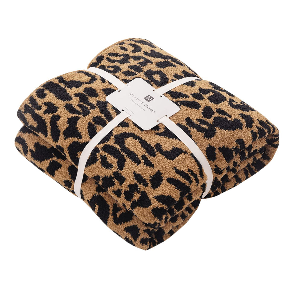 MH MYLUNE HOME ultra soft leopard throw draped on sofa for cozy evenings.