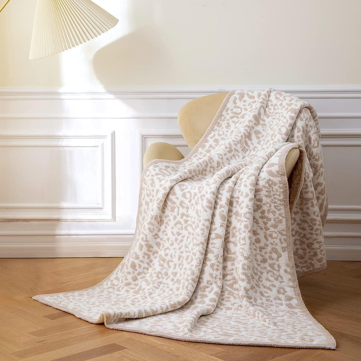 MH MYLUNE HOME wrinkle-resistant leopard throw retains shape and softness.