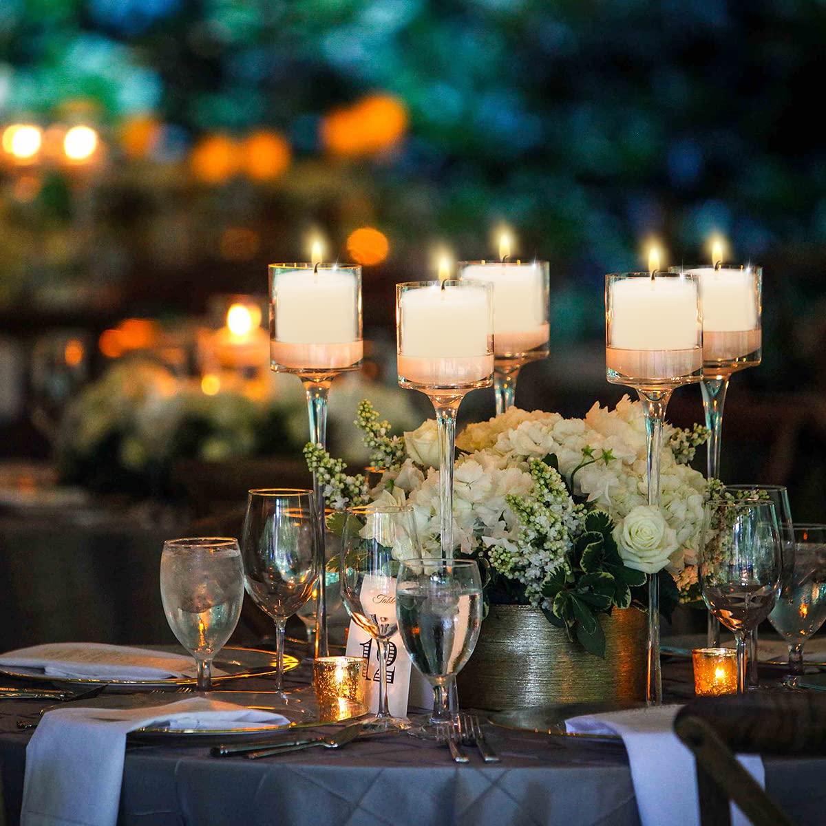 Mi Ka YIa wedding decor votives on reception tables.