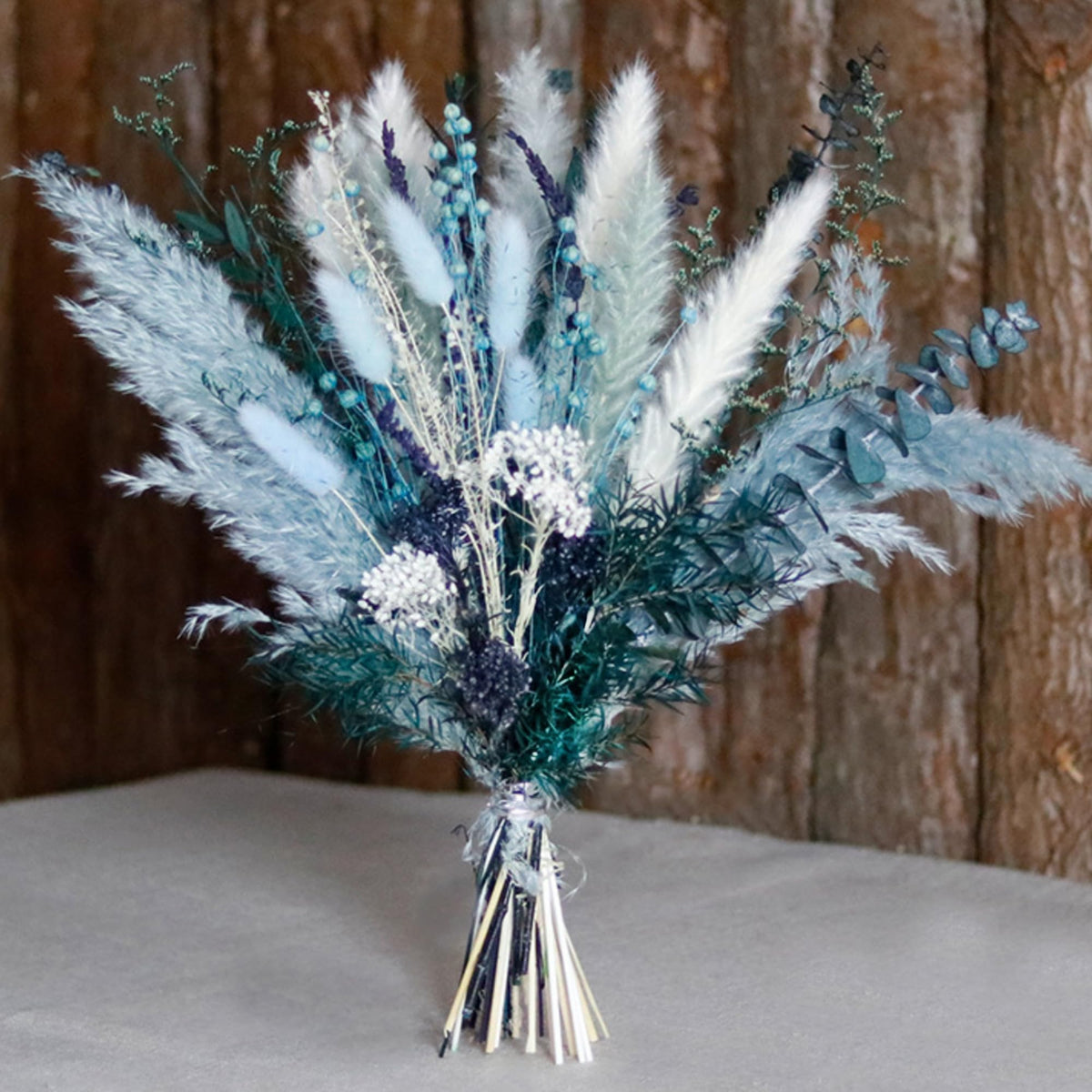 Mifgra dusty blue flower arrangement, 17 inches, enhances table centerpieces.