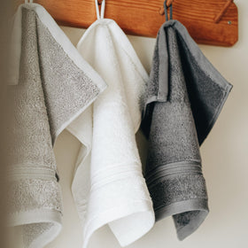 Milara Creations elegant silver-gray washcloth enhances modern bathroom décor