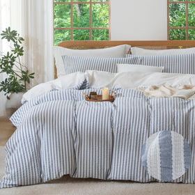 MILDLY blue striped duvet cover shows jacquard texture for a luxe boho look.