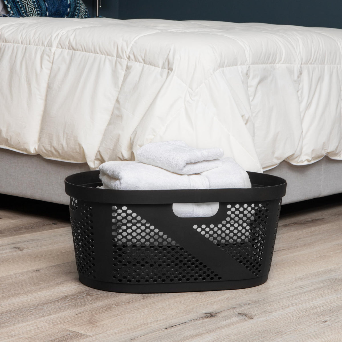 Mind Reader 40L ventilated basket side view highlighting perforated sides for airflow.