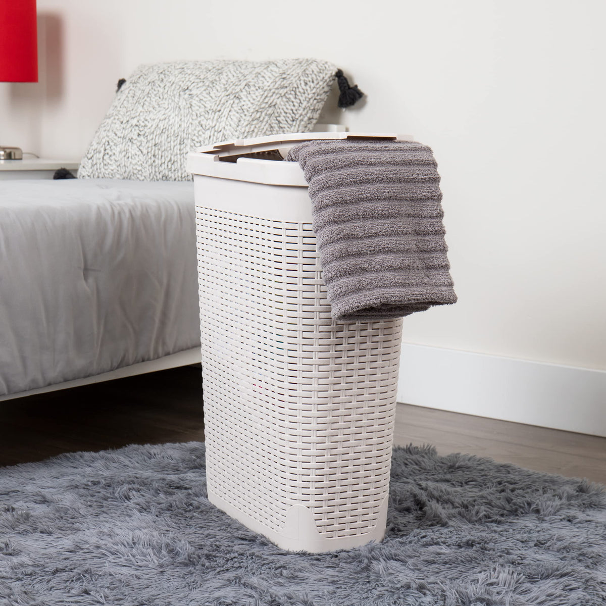 Narrow profile design fits tight bathrooms while keeping contents out of sight.