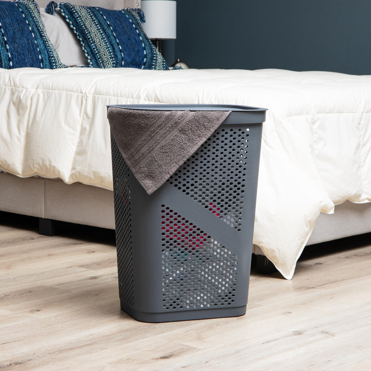 Mind Reader Slim Laundry Hamper with ventilated sides promotes airflow and odor control.