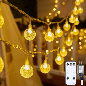 Minetom Globe Lights illuminate outdoor spaces with a warm white glow on a 33-foot strand.