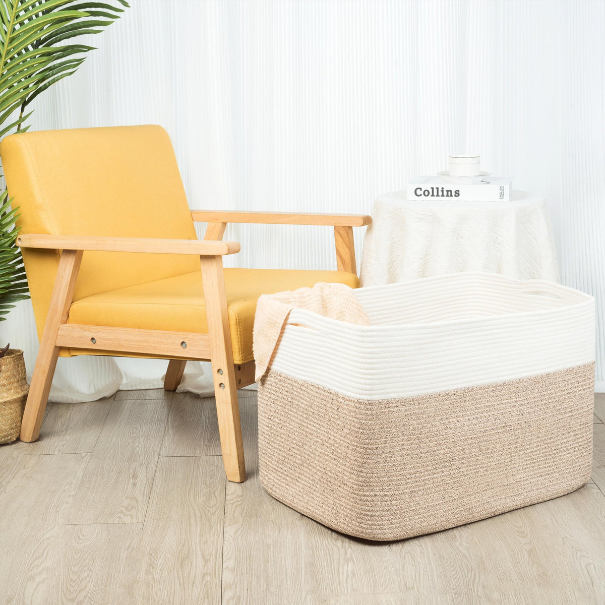Mintwood Design collapsible blanket basket folds for compact storage.