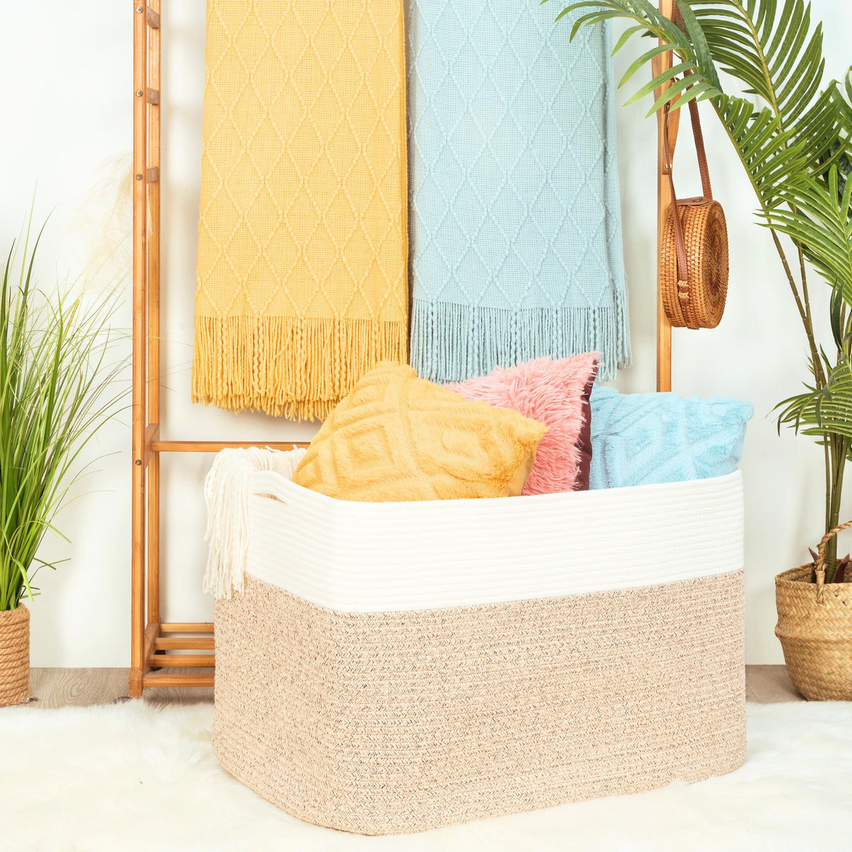 Mintwood Design rectangle rope storage basket with handles keeps clutter organized.
