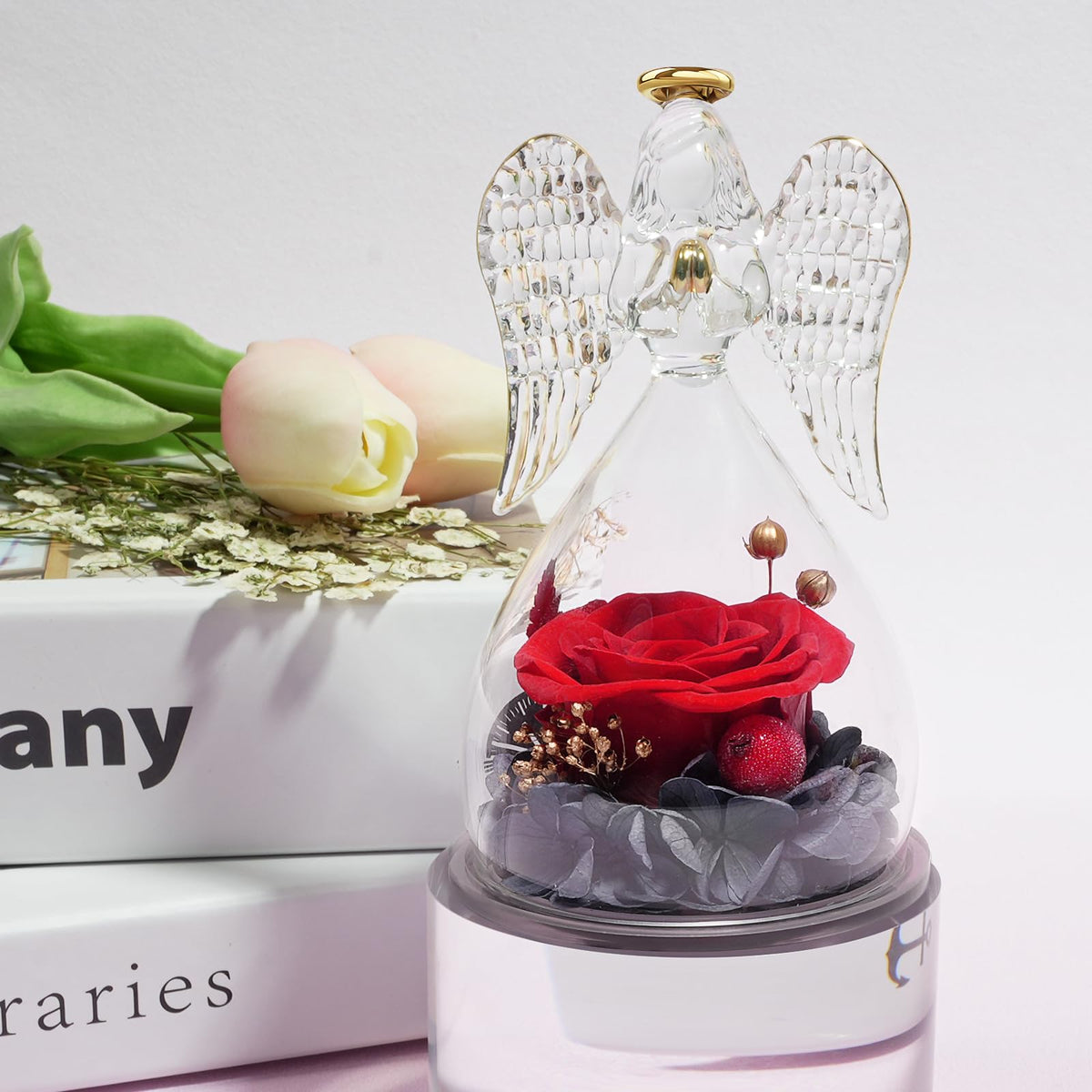 Miofula glass angel with preserved rose adds maintenance-free decor to any room.