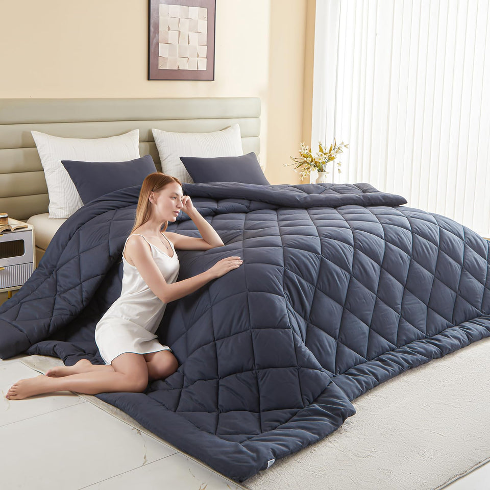 MIOTO 128x120 oversized king comforter draped over bed for full coverage.