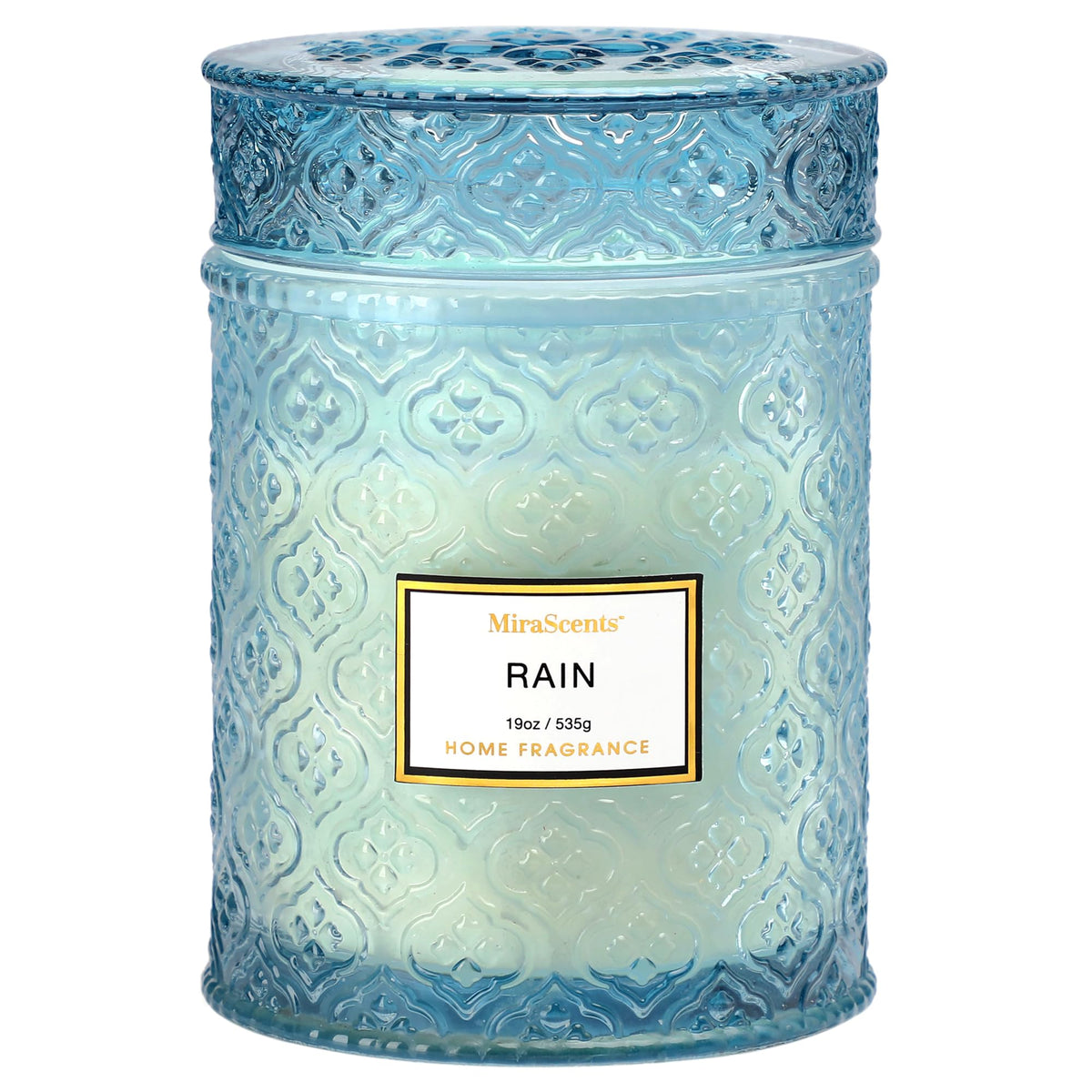 MIRASCENTS Rain Summer Candle in blue jar for calming ambience.