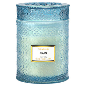 MIRASCENTS Rain Summer Candle in blue jar for calming ambience.