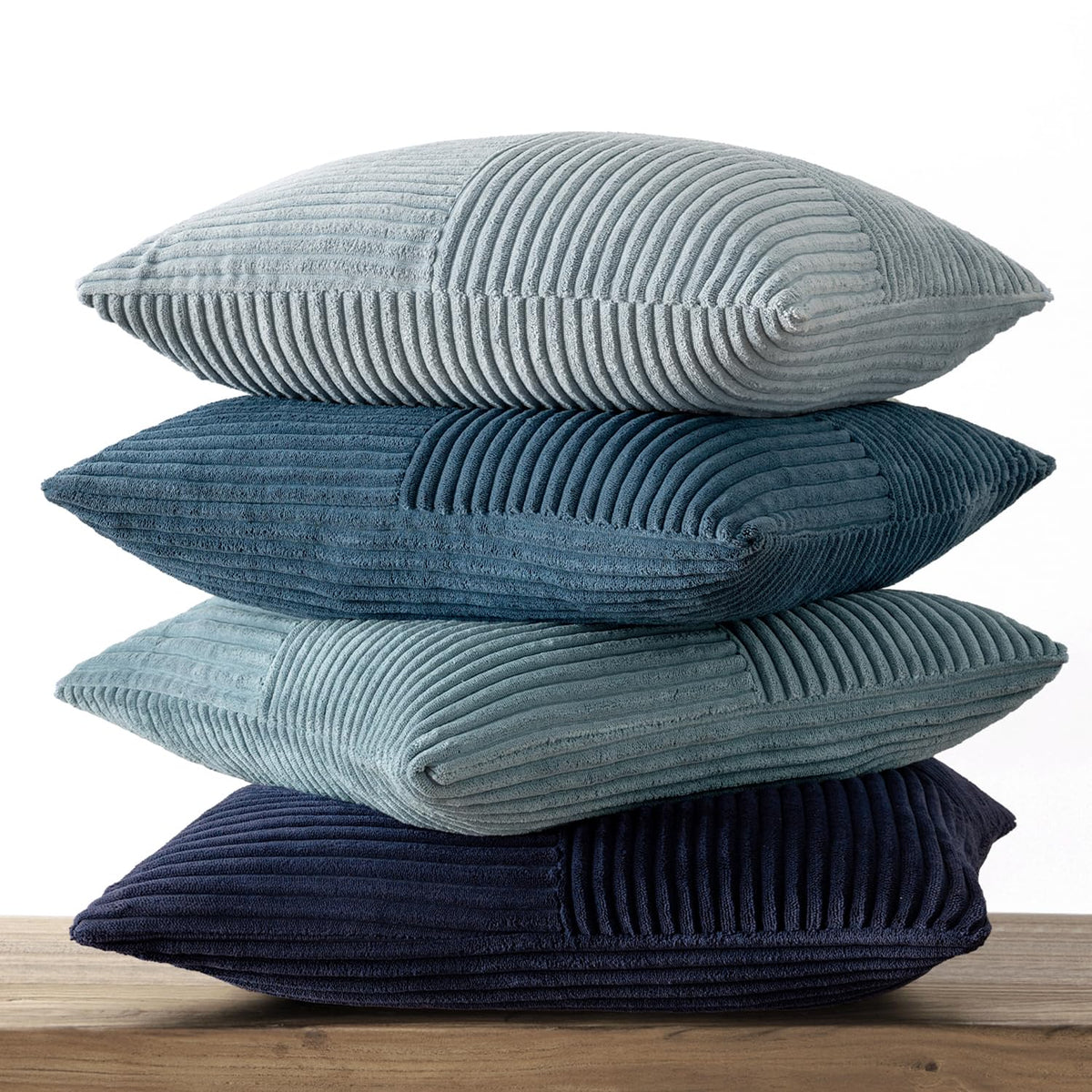MIULEE four-pack pillow covers ready to mix and match on a sofa