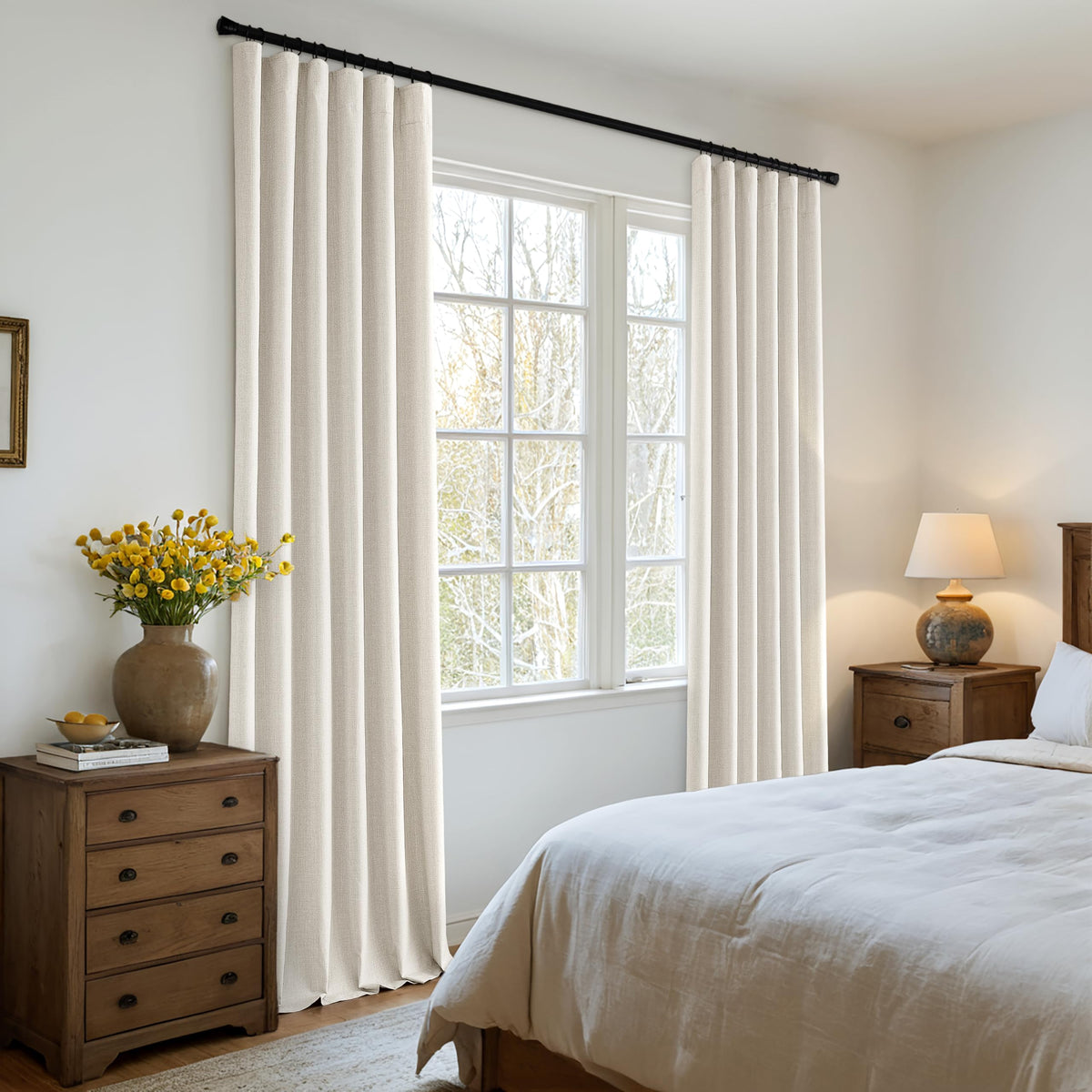 MIULEE blackout curtains in bedroom setup with elegant pleats for a restful ambiance.