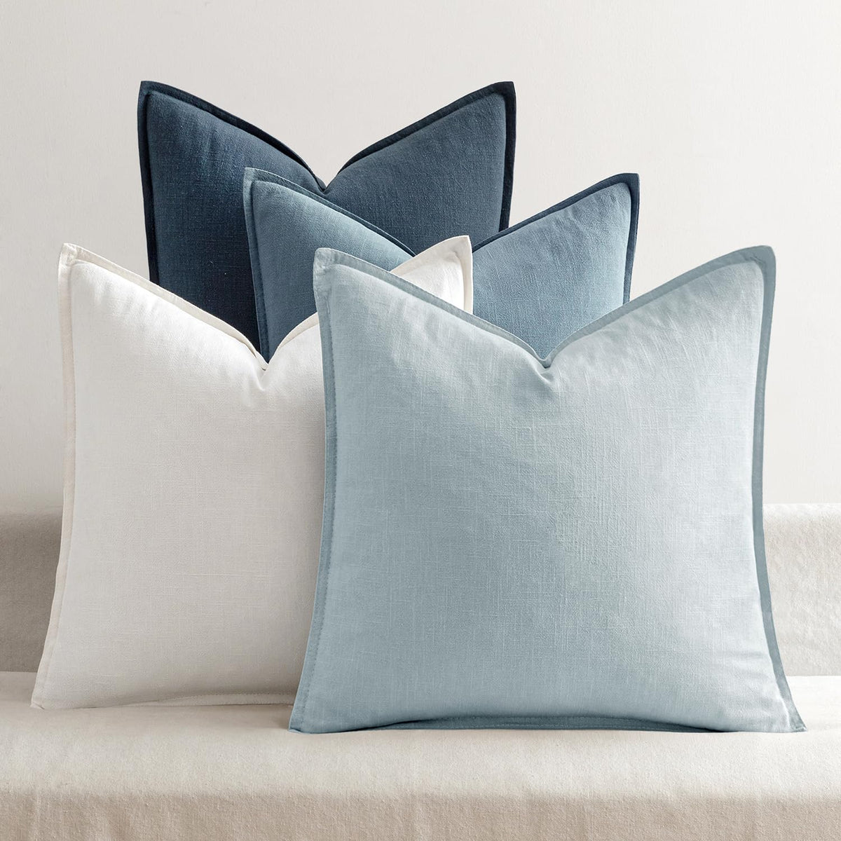 MIULEE blue pillow covers four-pack flatlay for versatile living room styling