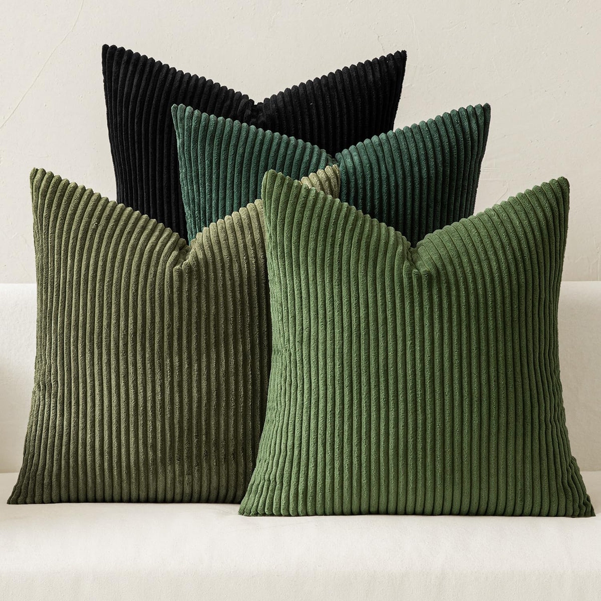 MIULEE boho farmhouse pillow cover in emerald green for a lush sofa accent