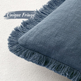 MIULEE boho fringe design pillow cover styled on a sofa setup.