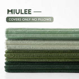 MIULEE pillow cover in bedroom scene conveys calming green tones.