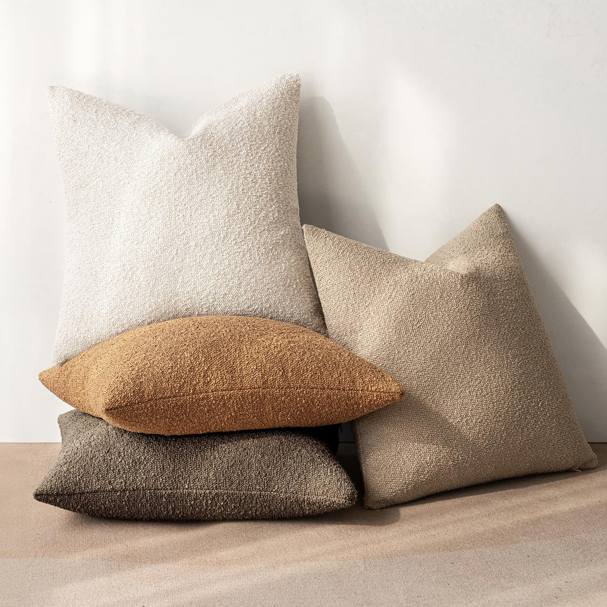 MIULEE Boucle pillow cover on sofa demonstrating soft handfeel and versatile decor