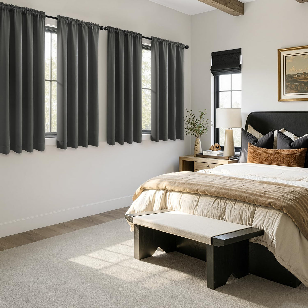MIULEE dark grey curtains block light to create a calmer bedroom.
