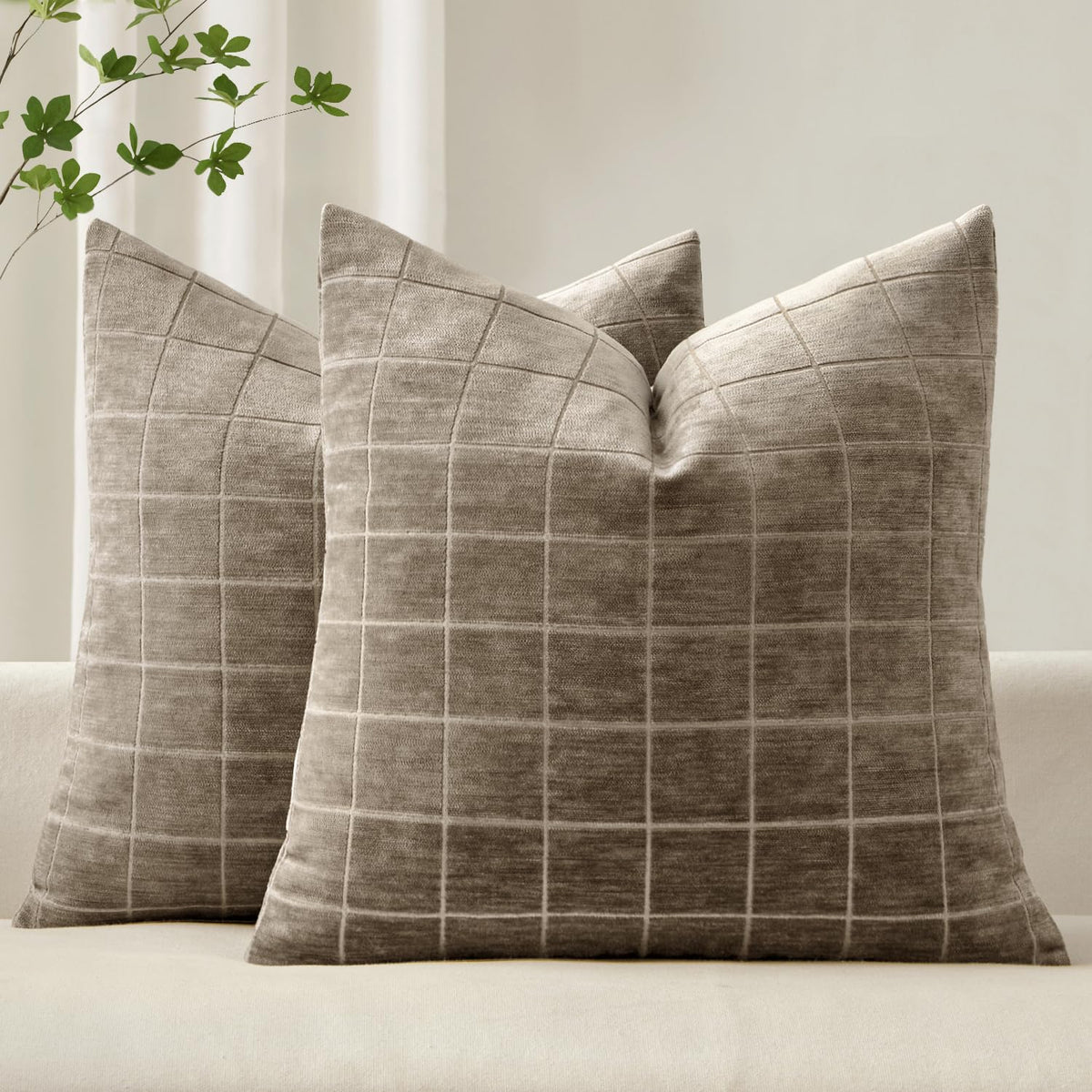 MIULEE decorative chenille plaid pillow cover on a sofa adds timeless charm.