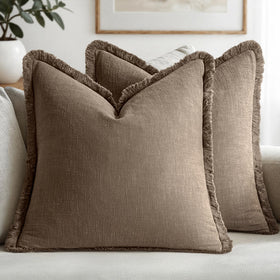 MIULEE cocoa brown fringe pillow cover on sofa to enhance cozy decor.