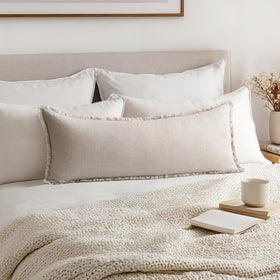MIULEE decorative pillow cover in neutral linen with fringe for sofa styling.