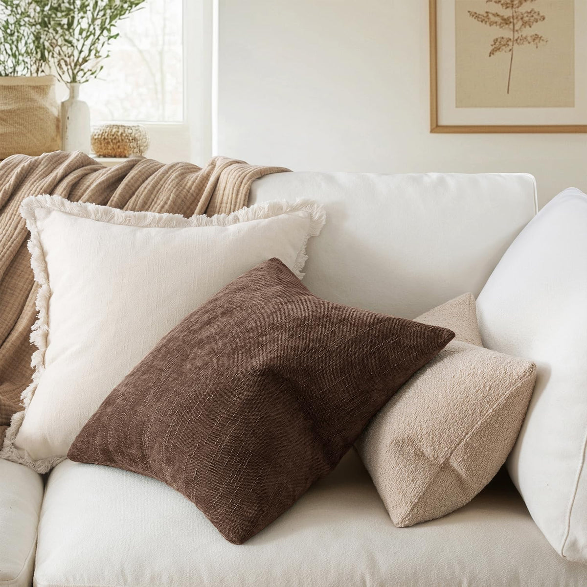 MIULEE decorative pillow cover on sofa adds warmth and texture to living room