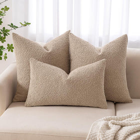 MIULEE decorative taupe pillow cover adds calm to the sofa.