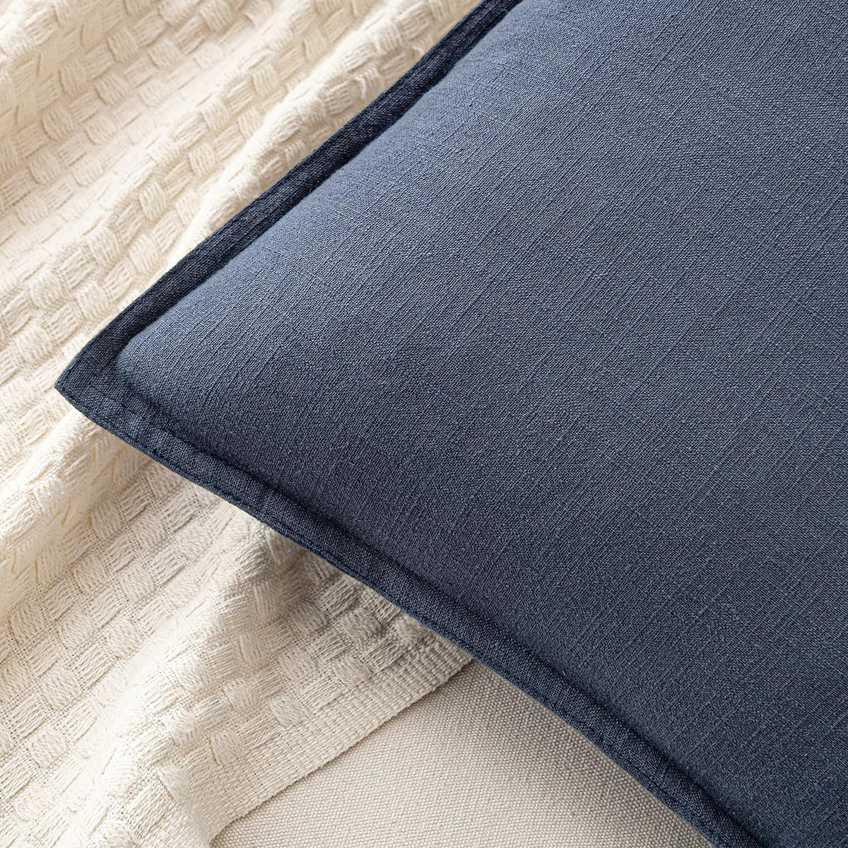 MIULEE flange-edged pillow cover in indigo enhances boho living room decor