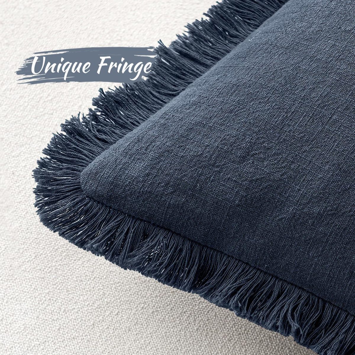 MIULEE indigo linen fringe pillow cover on sofa adds cozy style to living room.