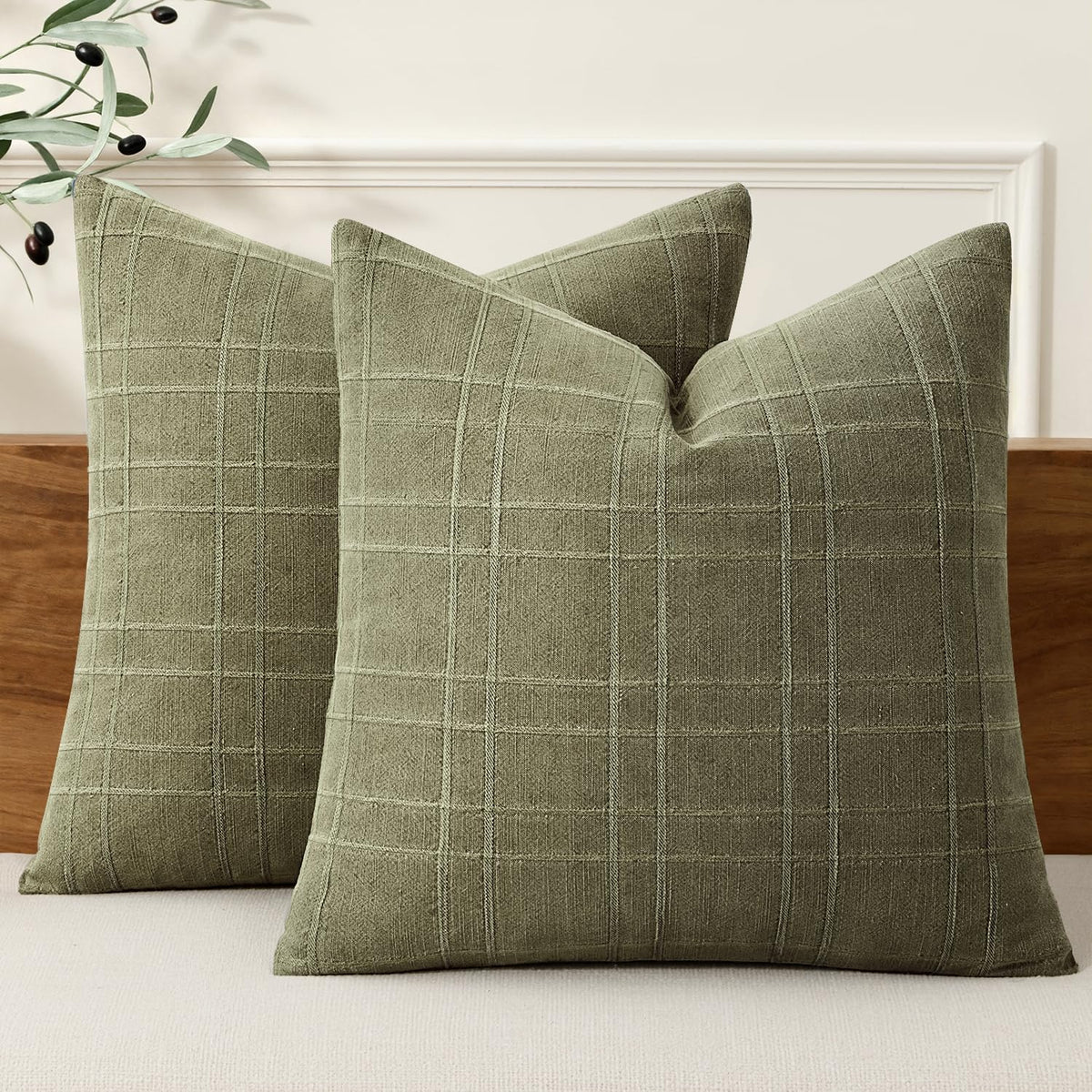 MIULEE linen check pillow cover in sage green adds farmhouse charm to a sofa